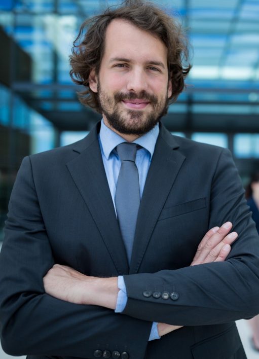 portrait-of-businessman-2021-08-28-17-23-27-utc.jpg